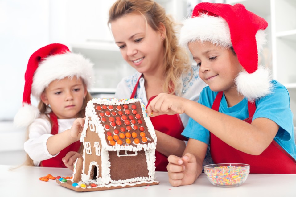 Preparing a gingerbread cookie house